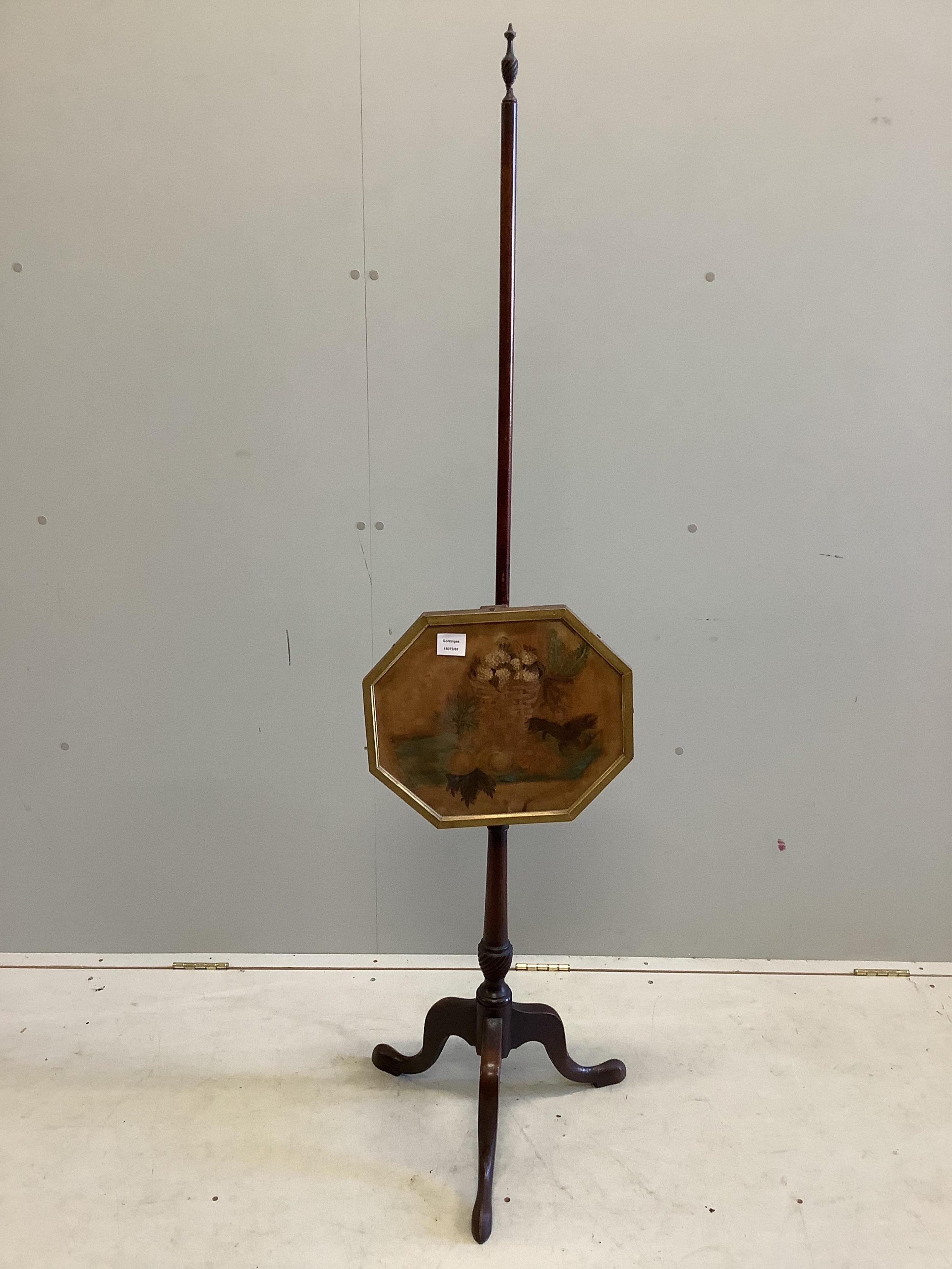 A George III mahogany pole screen with octagonal painted banner, width 46cm, depth 46cm, height 161cm